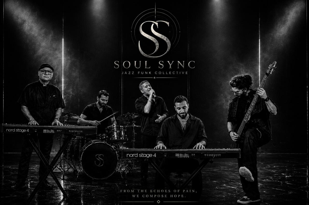 Soul Sync performing live on a dark stage in Dubai